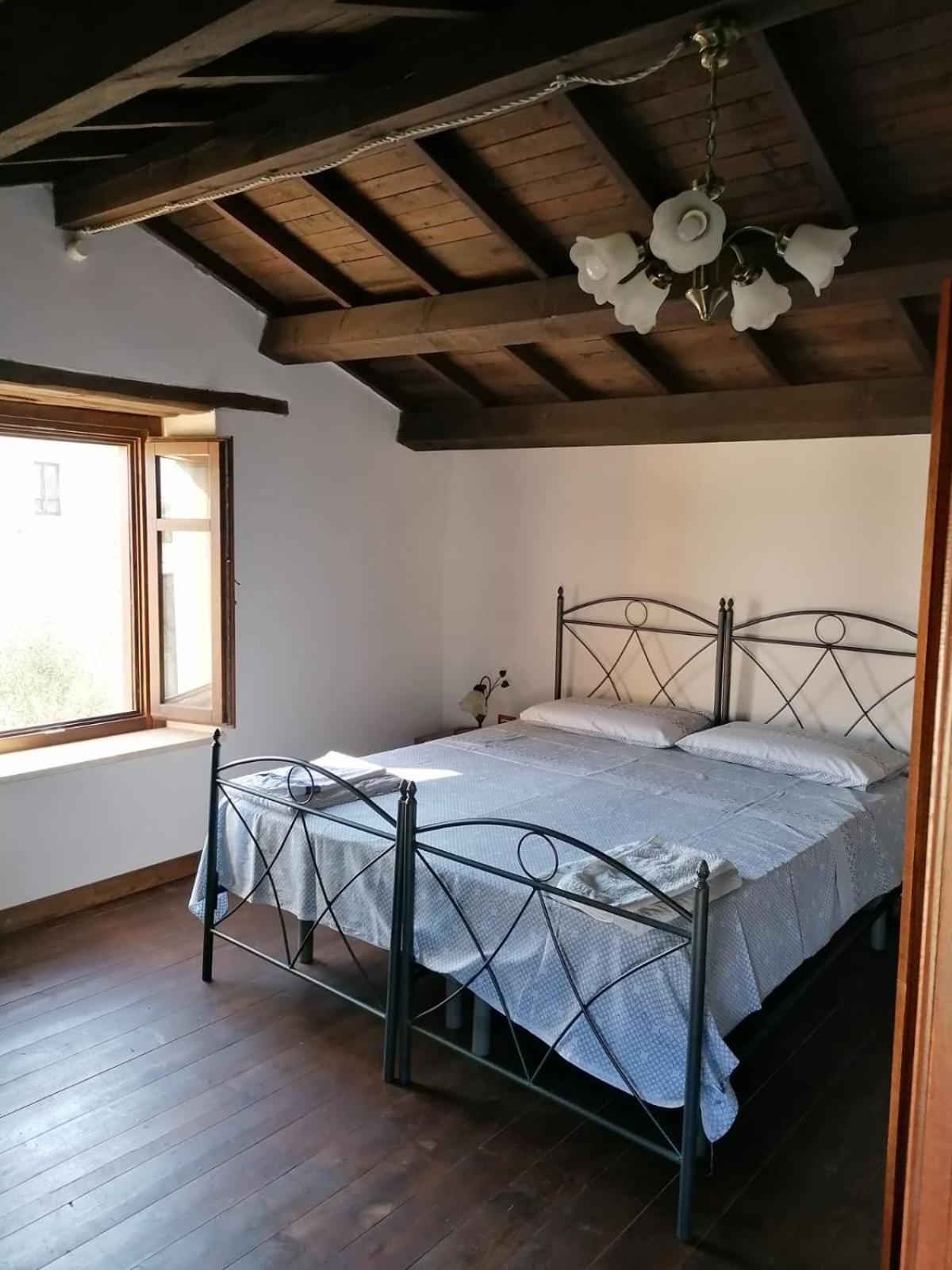 Апартаменты Domus De Jara - Casa Montis Baradili Номер фото